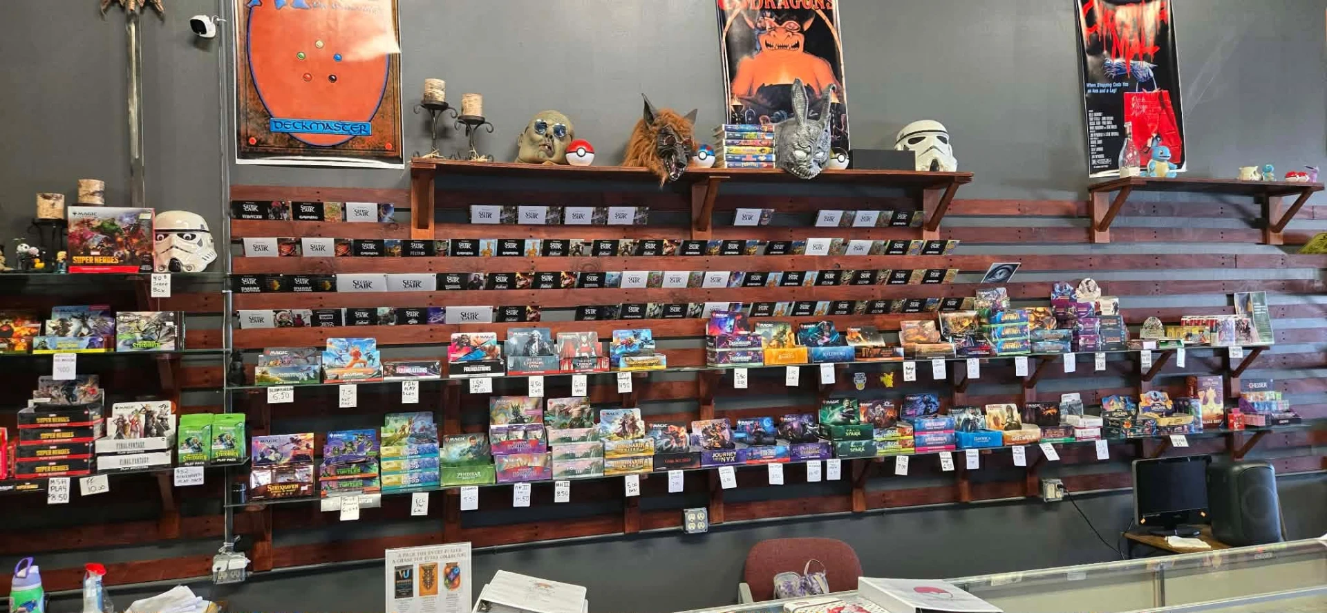 Shelves of sealed product, retro games, movies and collectibles