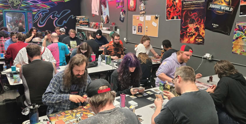 Packed tables of players during a card game tournament